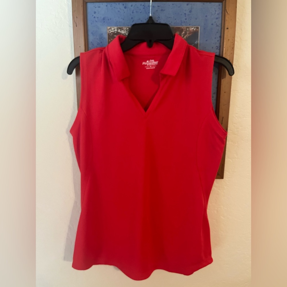 Red sleeveless women’s golf shirt nwot